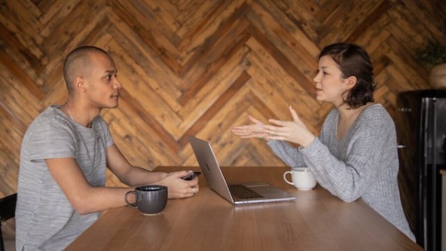 Young diverse colleagues working remotely together