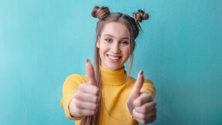 Woman in Yellow Turtleneck Sweater Smiling