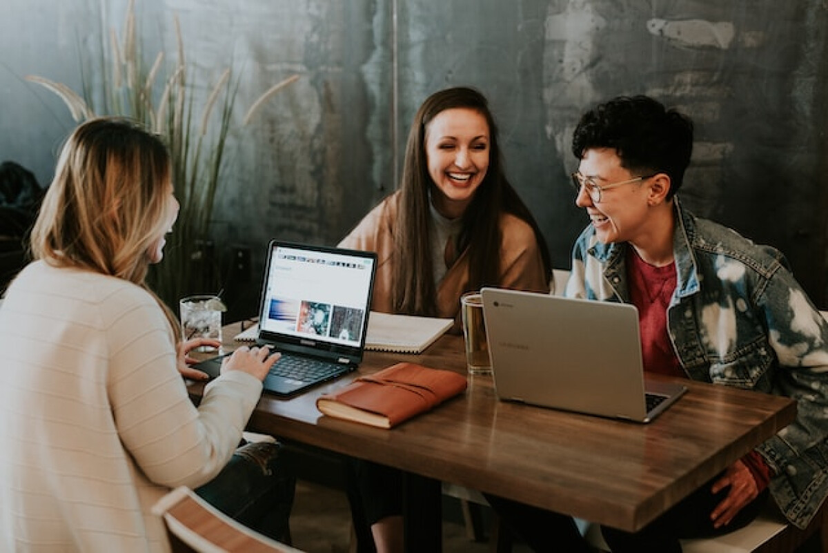 A group of colleagues at a desk