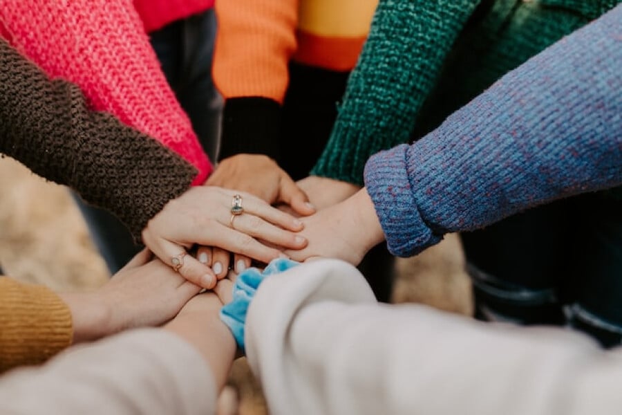 Hands in all together group image