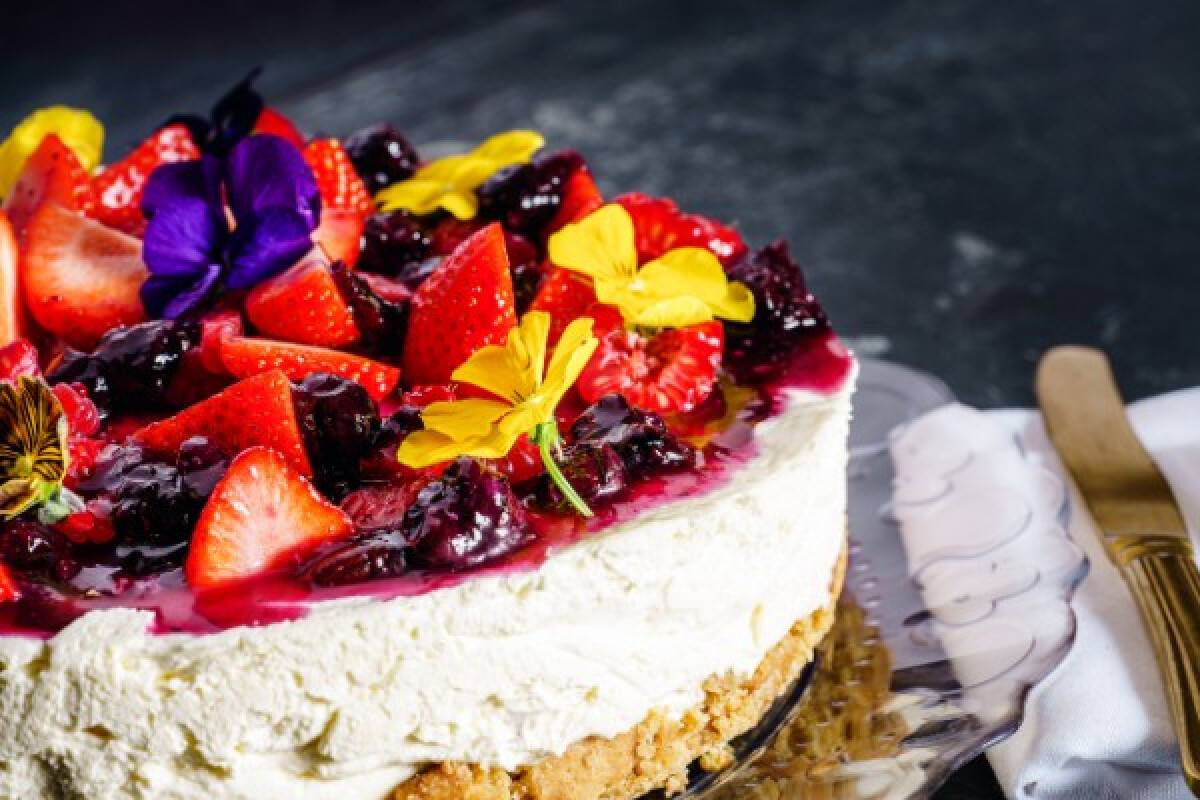 Image of a posh, fresh fruit laden cake
