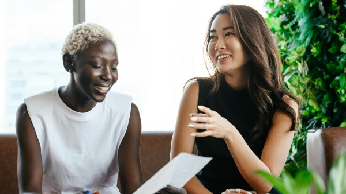 Diverse cheerful colleagues having a conversation