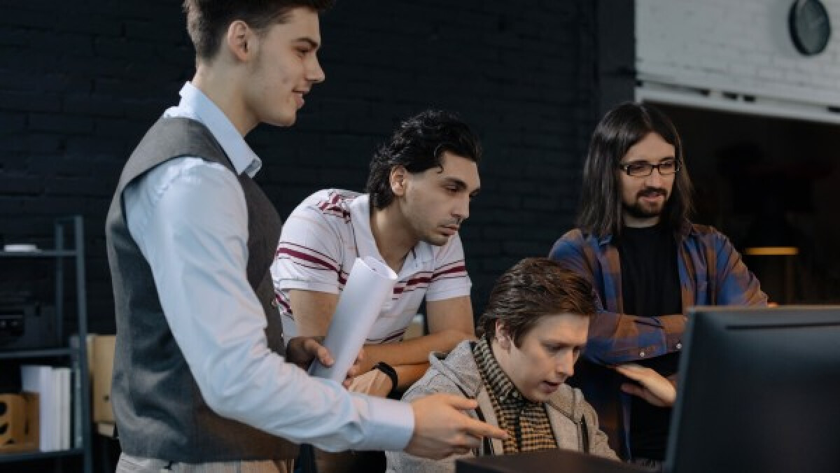 Employees discussing a project