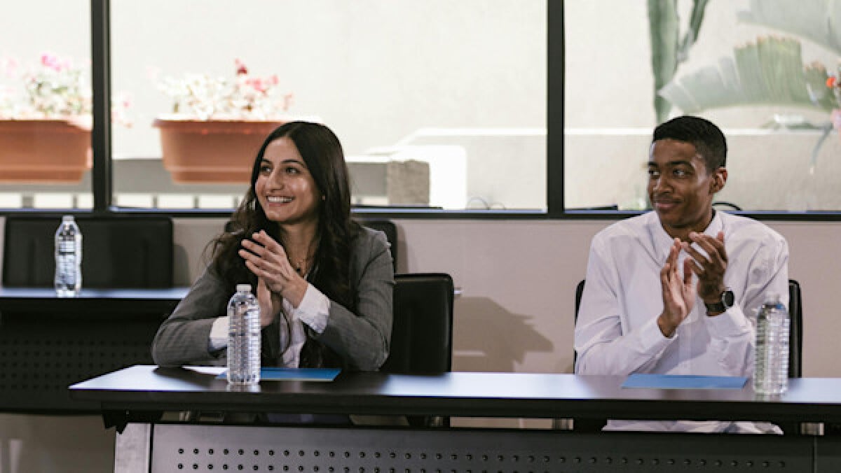 Man and Woman Clapping their Hands