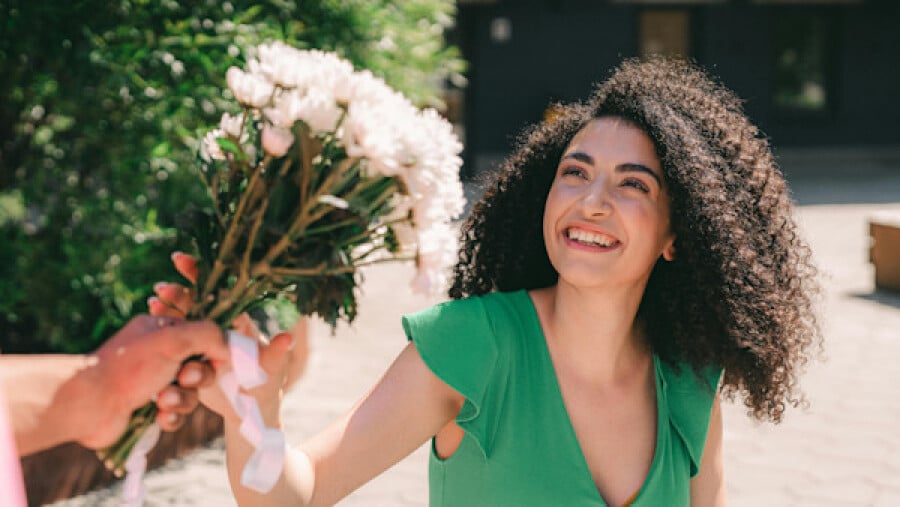A Woman Receiving a Bouquet