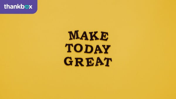 Motivational quote "Make Today Great" on yellow background