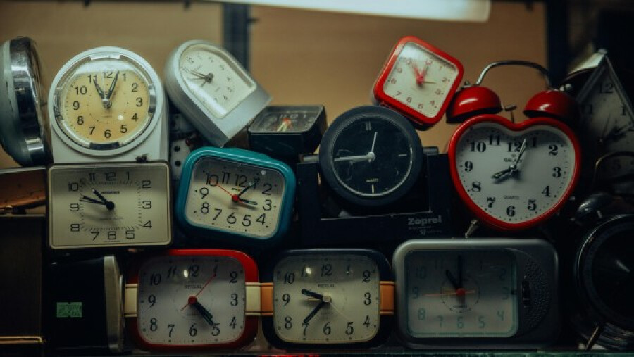 A pile of alarm clocks