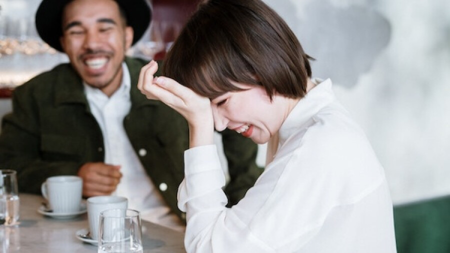 Two people building rapport at a table