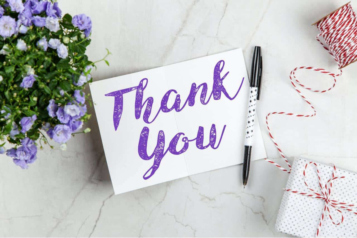 A picture showing a thank you card and gift wrap